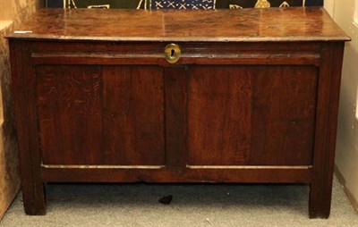 Lot 1125 - An early 18th century panelled oak coffer, with hinged lid and brass escutcheon, 115cm by 51cm...