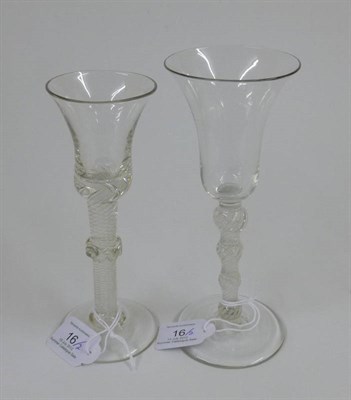 Lot 16 - A Wine Glass, circa 1750, the bell shape bowl on a four-knopped air twist stem, 18cm high; and...