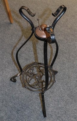 Lot 1130 - A 19th century painted wrought iron kettle stand