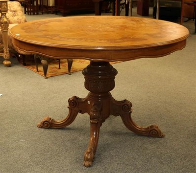 Lot 1134 - A reproduction circular marquetry inlaid drawer leaf pedestal dining table, 120cm diameter by...