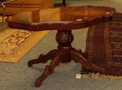 Lot 1134 - A reproduction circular marquetry inlaid drawer leaf pedestal dining table, 120cm diameter by...