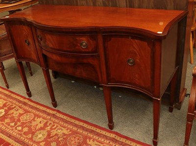Lot 1139 - A Regency style mahogany dining suite, comprising a twin pillar dining table with additional...