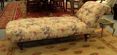 Lot 1142 - A Victorian chaise-longue in buttoned floral fabric, 187cm
