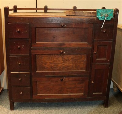 Lot 1146 - A circa 1930s oak writing bureau, together with an early 20th century oak chest of drawers with...