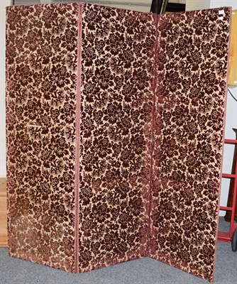 Lot 1153 - A velvet three fold screen, dimensions of each panel 59cm by 185cm