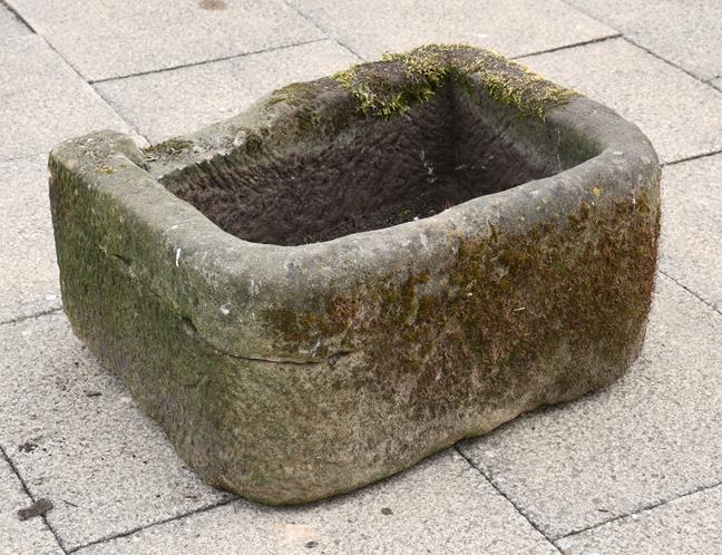 Lot 1158 - A weathered stone trough, 80cm by 60cm by 40cm