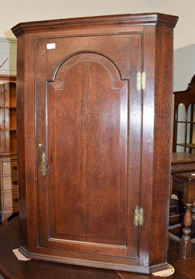 Lot 1186 - A George III hanging oak corner cupboard, 75cm by 39cm by 107cm high, a Titchmarsh and Godwin style