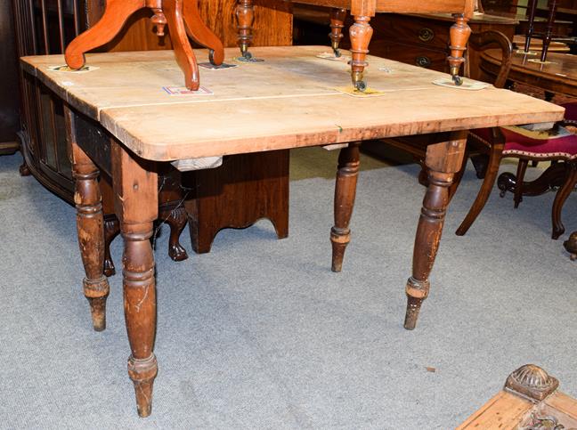 Lot 1190 - A Victorian pine drop leaf kitchen table, 103cm (open) by 107cm by 75cm