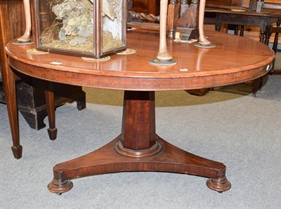 Lot 1194 - A Regency circular pedestal breakfast table, 122cm by 68cm