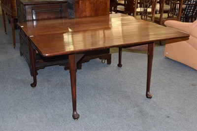 Lot 1210 - A 19th century mahogany gate leg table on pad feet, 130cm (open) by 137cm by 73cm