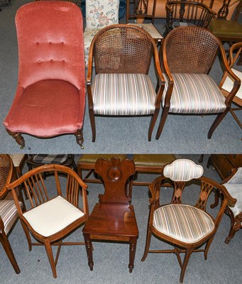 Lot 1226 - Two carved horseshoe chairs, two Edwardian chairs, a plank seated chair and a buttoned chair (6)