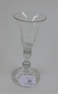 Lot 26 - A Wine Glass, circa 1740, the bell shaped bowl on bobbin knopped stem and folded conical foot,...