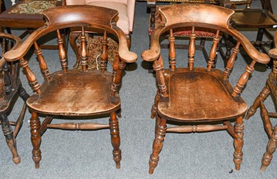 Lot 1232 - Four ash and elm captain's chairs