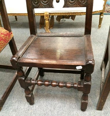 Lot 1237 - A late 17th century oak high back chair, together with an 18th century provincial elm rush...