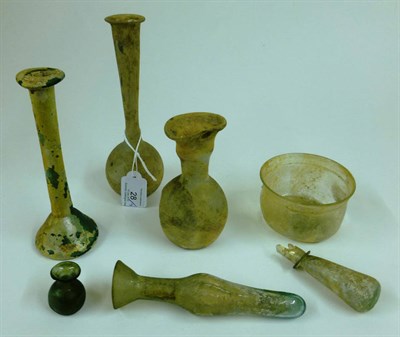Lot 28 - Six Early Glass Vessels, late Roman period, probably Syrian, 3rd/4th century AD, comprising...