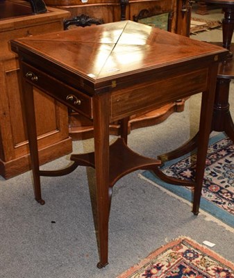 Lot 1253 - A 19th century inlaid mahogany envelope card table, 56cm square by 74cm