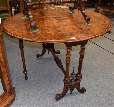 Lot 1257 - A Victorian burr walnut Sutherland table, 113cm by 94cm by 72cm