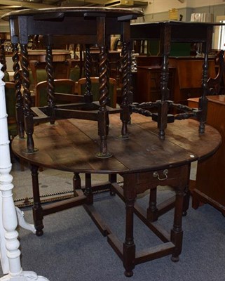 Lot 1279 - A 19th century oak gateleg table, 133cm by 122cm by 72cm, a smaller 1920's example, and an oak side