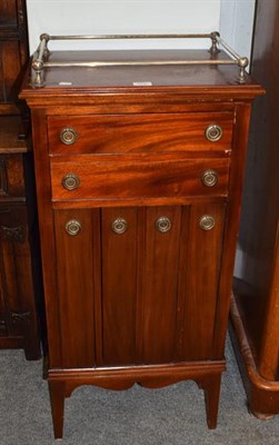 Lot 1296 - An Edwardian mahogany music cabinet with gallery, 51cm by 37cm by 108cm