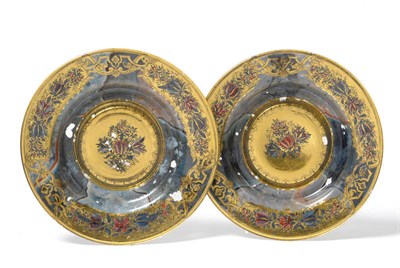 Lot 37 - A Pair of Mercuric Gilded and Kaltmalerei Decorated Circular Shallow Dishes, Central European, 18th