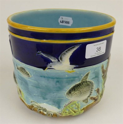 Lot 38 - A George Jones Majolica Jardinière, circa 1880, moulded with seagulls, fish and shell fish...