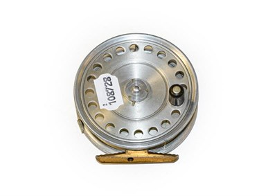 Lot 3098 - A Hardy St John 3 7/8'' Fly Reel in spitfire finish with brass foot and 3 screw latch.