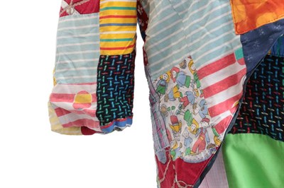 Lot 3131 - Roy 'Chubby' Brown Stage Worn Jacket And Trousers multi coloured patchwork long tail jacket,...