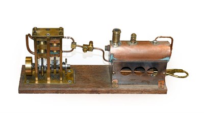 Lot 3253 - Brass Stationary Steam with twin oscillating cylinders 4'', 10cm high, on wooden base with...