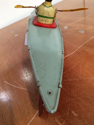 Lot 3258 - Abbey Toys (Made In Germany) The Singles Champion Kayak clockwork with three colour hull and figure