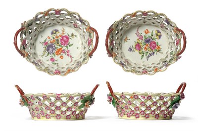 Lot 65 - A Pair of First Period Worcester Porcelain Yellow Ground Oval Baskets, circa 1765, the twig handles