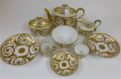 Lot 70 - A Spode Porcelain Tea Service, circa 1810, with bands of gilt and red scrolling acanthus centred by