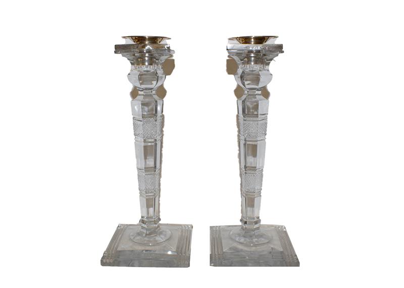 Lot 12 - A pair of George VI silver mounted cut glass candlesticks, the silver mounts by John Grinsell &...