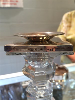 Lot 12 - A pair of George VI silver mounted cut glass candlesticks, the silver mounts by John Grinsell &...
