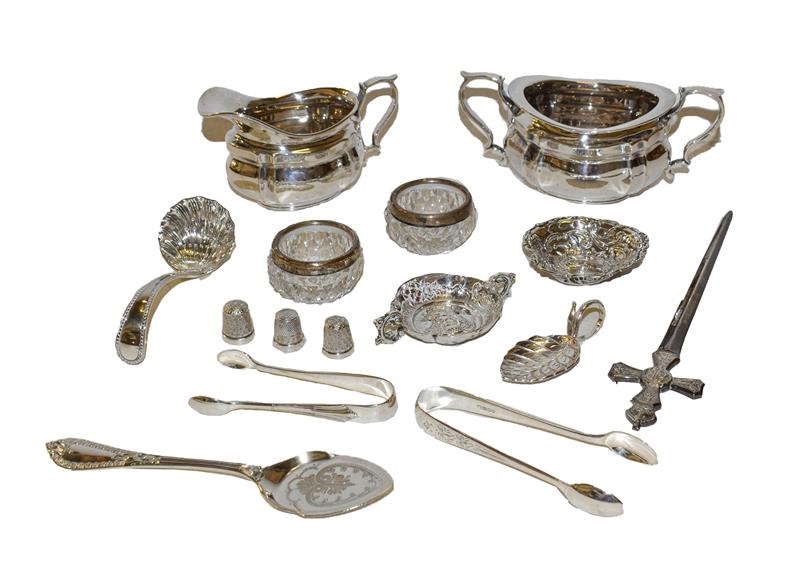 Lot 24 - A collection of assorted silver and silver plate, the silver including a commemorative paper knife