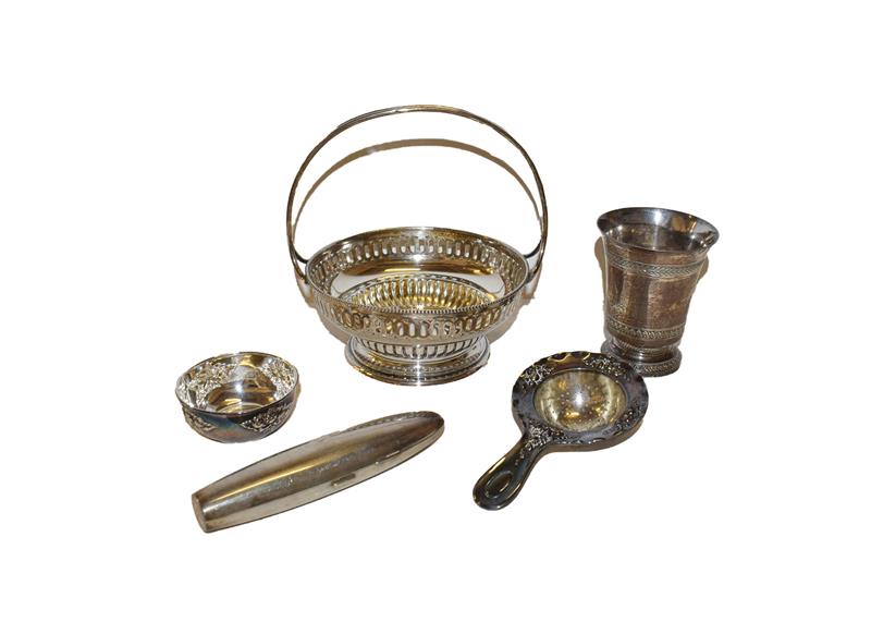 Lot 32 - A collection of silver comprising a silver basket, possibly Polish, mid 20th century, 14cm...