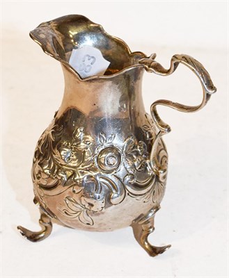 Lot 43 - A Victorian silver cream jug, probably by Edward Farrell, London, 1845, pear shaped and on...