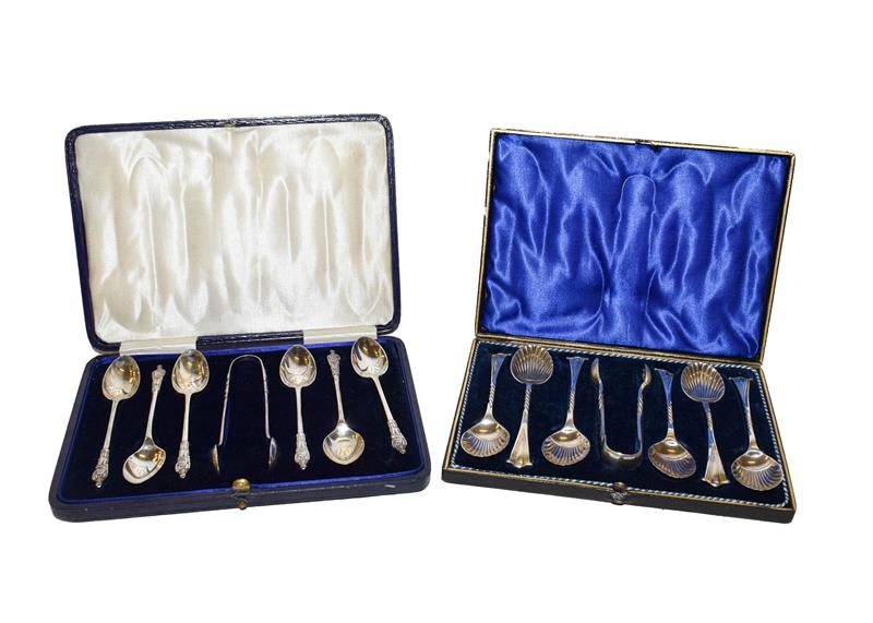 Lot 55 - A cased set of six George V silver teaspoons and a pair of sugar tongs, by Robert Pringle &...