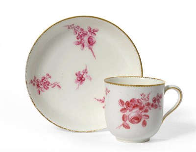 Lot 83 - A Vincennes Porcelain Coffee Cup and Saucer, 1755, painted in puce monochrome with scattered flower