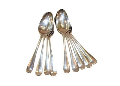 Lot 83 - A set of nine George II silver table spoons by Elias Cachart, London. 1747 in the Hanoverian...