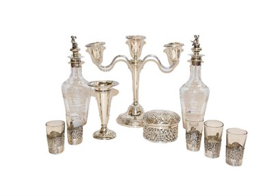 Lot 91 - A collection of assorted silver, including a three-light candelabra, a dressing table box,...