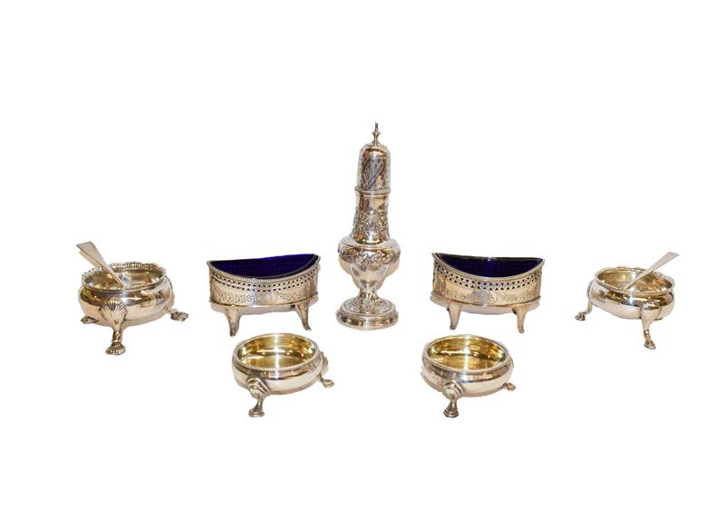 Lot 92 - A collection of assorted silver condiment items, comprising two similar George III salt...