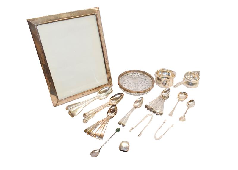Lot 97 - A collection of silver, including a quantity of George III and later flatware of various...