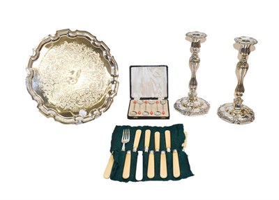 Lot 99 - A collection of assorted silver plate comprising a pair of candlesticks, a salver and various items
