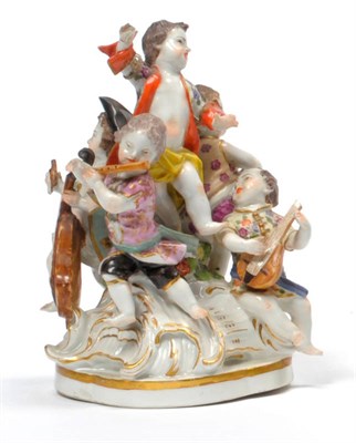Lot 87 - A Meissen Porcelain Figure Group, circa 1760, modelled as five putti about a scroll moulded...