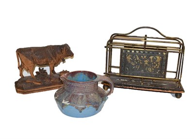 Lot 111 - A 19th century Aesthetic movement brass letter rack, a Black Forest carved model of a bull and...