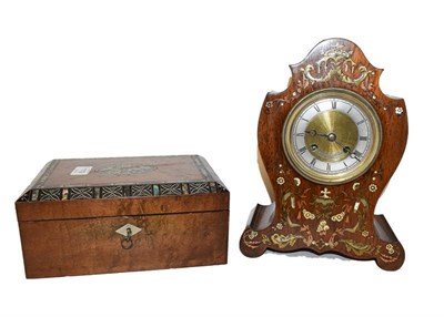 Lot 119 - A 19th century French rosewood cased mantel clock with mixed metal inlays, brass and silvered...