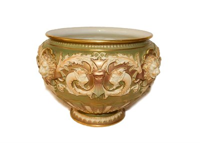Lot 123 - Royal Worcester jardiniere moulded with lion masks and scroll work on a gilt ground with...