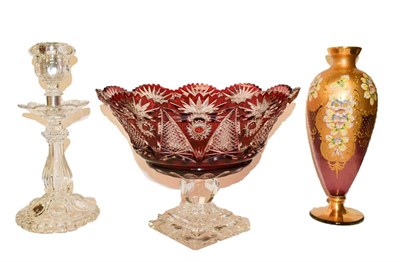 Lot 132 - A Baccarat candlestick, ruby glass centrepiece and a gilded glass vase
