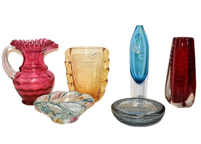 Lot 139 - An Orrefors glass vase, four pieces of Whitefriars glass and a cranberry glass jug (6)