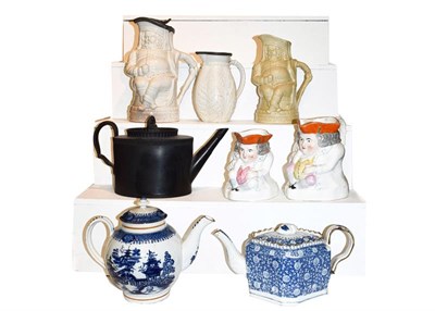 Lot 149 - A quantity of 19th century pottery including pearlware teapots, a black basalt teapot,...